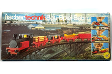 Load image into Gallery viewer, Fischertechnik Bau-Spiel-Bahn Train Playset packaging with colorful graphics and brand logo.
