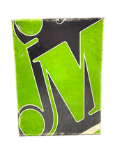 Load image into Gallery viewer, Packaging shot displaying bold graphic design in green and black.
