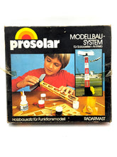 Carica l'immagine nel visualizzatore di Gallery, Prosolar Windmotor model kit packaging showing colorful graphics and a child using the kit.
