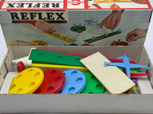 Carica l'immagine nel visualizzatore di Gallery, Congost Reflex Airplane Playset box side view with colorful design and hands illustration.
