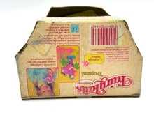 Carica l'immagine nel visualizzatore di Gallery, Colorful cardboard box for Hasbro Fairy Tails with graphic designs and open top.
