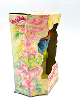 Carica l'immagine nel visualizzatore di Gallery, Packaging detail of Hasbro Fairy Tails box with vibrant patterns and torn edge.
