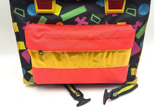 Load image into Gallery viewer, Side view of the colorful Scout Swing Sternjakob backpack highlighting its design.
