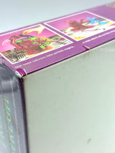 Load image into Gallery viewer, Detail of the sealed corner of Frega la Strega game box with colorful graphics.

