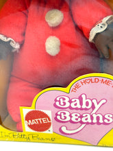 Load image into Gallery viewer, Close-up detail of the doll's body, highlighting buttons and packaging.
