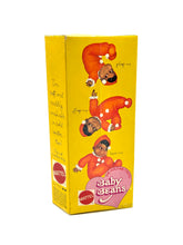 Load image into Gallery viewer, Side view of the doll's packaging, featuring illustrations and brand logo.
