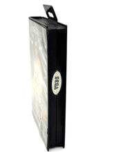 Load image into Gallery viewer, Detail view of the smooth finish on the game case
