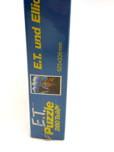Load image into Gallery viewer, Side view of the E.T. puzzle box showing title and illustration.

