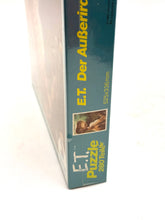 Load image into Gallery viewer, Side view of vintage Waddingtons E.T. jigsaw puzzle showing ET image.
