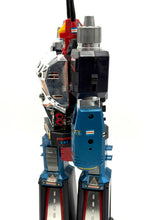 Load image into Gallery viewer, Side view of the robot toy showcasing mechanical details and standing pose.
