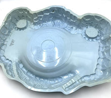 Carica l'immagine nel visualizzatore di Gallery, DINOFROZ arena base playset detail close-up showing rounded shape and ornate design in blue and white.

