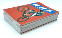 Carica l'immagine nel visualizzatore di Gallery, Side view of the Vintage BMX notebook showcasing its thick spine and illustrated cover.
