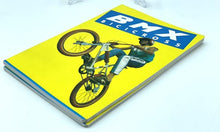 Carica l'immagine nel visualizzatore di Gallery, Side view of the Vintage BMX notebook showcasing the thick spine and bicycle illustration.
