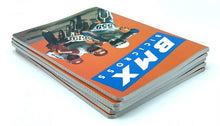 Load image into Gallery viewer, Side view of the BMX notebook featuring action imagery and a bold title.
