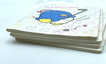 Carica l'immagine nel visualizzatore di Gallery, Side view of stacked notebooks showcasing colorful cartoon designs.
