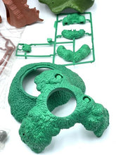 Carica l'immagine nel visualizzatore di Gallery, Famosa Disney Peter Pan treehouse playset detail view of multiple components in brown and green.
