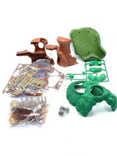 Carica l'immagine nel visualizzatore di Gallery, Famosa Disney Peter Pan treehouse playset detail view of various toy parts in brown and green.
