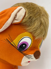Carica l'immagine nel visualizzatore di Gallery, Close-up detail of the orange plush dog's head with large eyes and whiskers.
