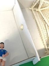 Load image into Gallery viewer, Single miniature soccer player in blue and white near the goal area.
