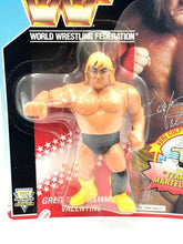 Load image into Gallery viewer, WWF Hasbro GREG VALENTINE action figure in transparent packaging showcasing branding.
