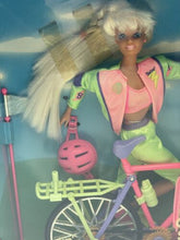 Load image into Gallery viewer, Side view of Mattel Barbie Bicyclin packaging with illustrations and colorful details.

