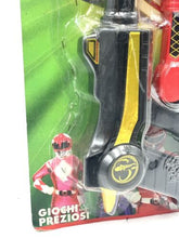 Load image into Gallery viewer, Detail shot of a toy weapon with a central emblem and character illustration.
