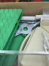 Load image into Gallery viewer, Detail view of Pimea Chalet toy bird house game components in different sizes.
