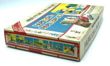 Load image into Gallery viewer, Kenner Give a Show Projector Toy side view showcasing colorful graphics and game title.
