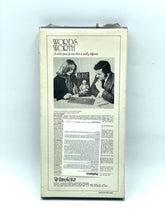 Load image into Gallery viewer, Back view of the Invicta Words Worth Game box displaying game description and illustration.
