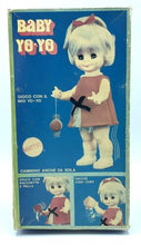 Load image into Gallery viewer, Packaging view of the 1967 Mattel Walk n Play doll with colorful design.
