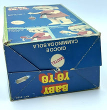 Load image into Gallery viewer, Close-up of the packaging for the 1967 Mattel Walk n Play doll with vibrant colors.
