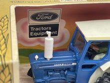 Load image into Gallery viewer, Britains Ford 6600 tractor engine detail close-up featuring Ford logo in blue and white.
