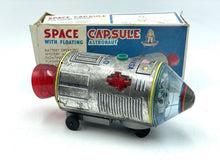 Load image into Gallery viewer, Modern Toys Japan packaging view of the vintage battery-operated space capsule toy with rocket design.
