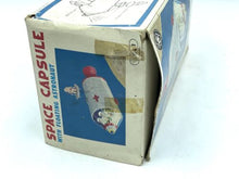 Load image into Gallery viewer, Modern Toys Japan side view of damaged toy packaging showing crumpled corner and graphic design
