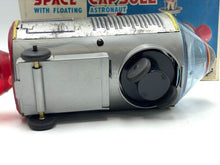 Load image into Gallery viewer, Modern Toys Japan side view of toy rocket featuring control knob and plastic body
