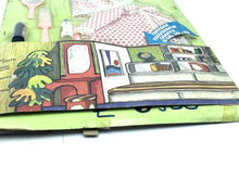 Load image into Gallery viewer, Close-up of the colorful illustrated pouch with zipper closure.
