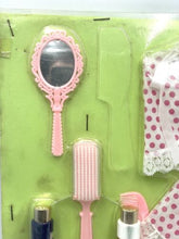 Load image into Gallery viewer, Close-up detail of the pink mirror with a reflective surface and handle.
