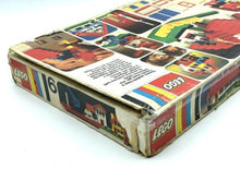 Load image into Gallery viewer, LEGO 1973 Vintage Basic set side view of box with colorful graphics and worn edges.
