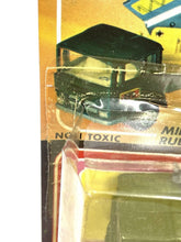 Load image into Gallery viewer, Mira Military Truck close-up detail showing transparent packaging and intricate design.
