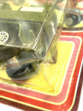 Load image into Gallery viewer, Mira Military Truck packaging detail featuring wheel and plastic cover.
