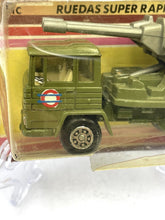 Load image into Gallery viewer, Close-up detail of Mira Military Truck 1:64 with transparent packaging.
