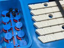 Load image into Gallery viewer, Detail close-up of a blue xylophone with colorful buttons and wooden bars.
