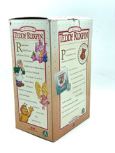 Load image into Gallery viewer, Side view of Teddy Ruxpin packaging with product list and brand logo.
