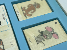 Load image into Gallery viewer, Another close-up of illustrated character cards from the bingo game.
