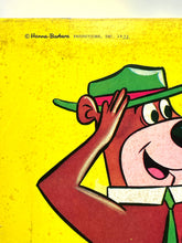 Load image into Gallery viewer, Close-up of a smiling cartoon character wearing a hat from the bingo game.
