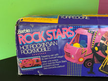 Carica l'immagine nel visualizzatore di Gallery, Close-up detail of Barbie Hot Rockin’ Van box design.
