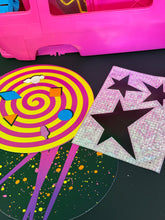 Carica l'immagine nel visualizzatore di Gallery, Barbie Hot Rockin’ Van Rock Mobile detail shot of colorful spiral and star designs.
