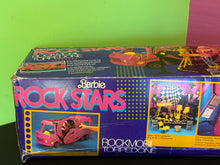 Carica l'immagine nel visualizzatore di Gallery, Side view of Barbie Hot Rockin’ Van packaging with rock star theme.
