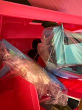 Carica l'immagine nel visualizzatore di Gallery, Various items in a bin, featuring red, blue, and black colors.
