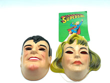 Load image into Gallery viewer, 1979 superman &amp; supergirl mask front view with smiling faces and party hats
